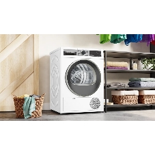 Сушильная машина Bosch WQG1420AME белый, 9 кг, сушка - конденсационная, программ - 15, 59.8 x 84.2 x 64.8 см