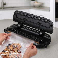 Вакуумный упаковщик Kitfort КТ-1550 ручной 110Вт 0.65Бар шир.пак.:30см черный